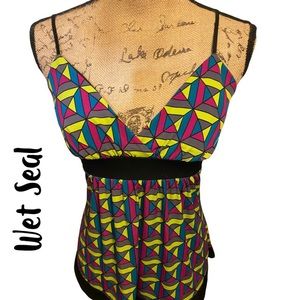 Women’s Top by Wet Seal, New Without Tags, Size M. Inseam: 14, Length:25.